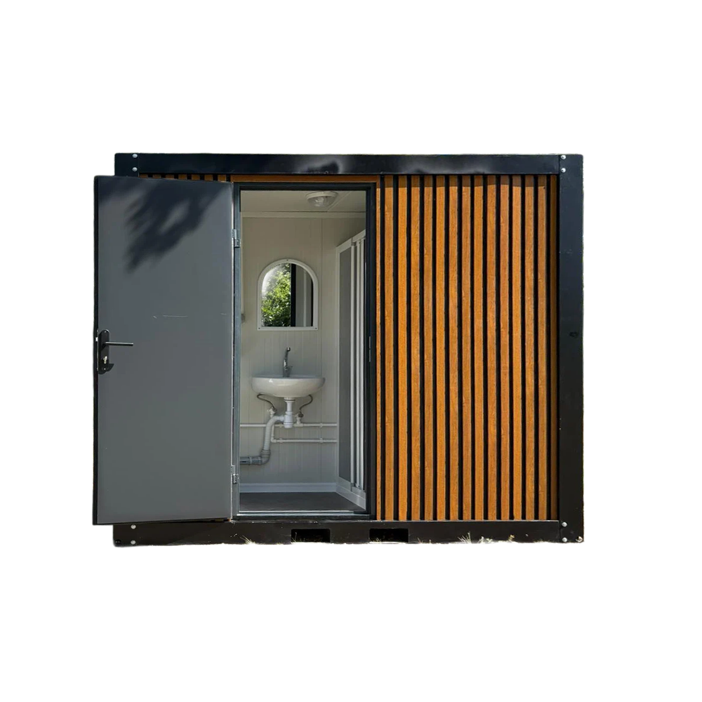 portable_bathroom_unit_interior_front_view_open_door Interior front view of a portable bathroom unit with door open.
