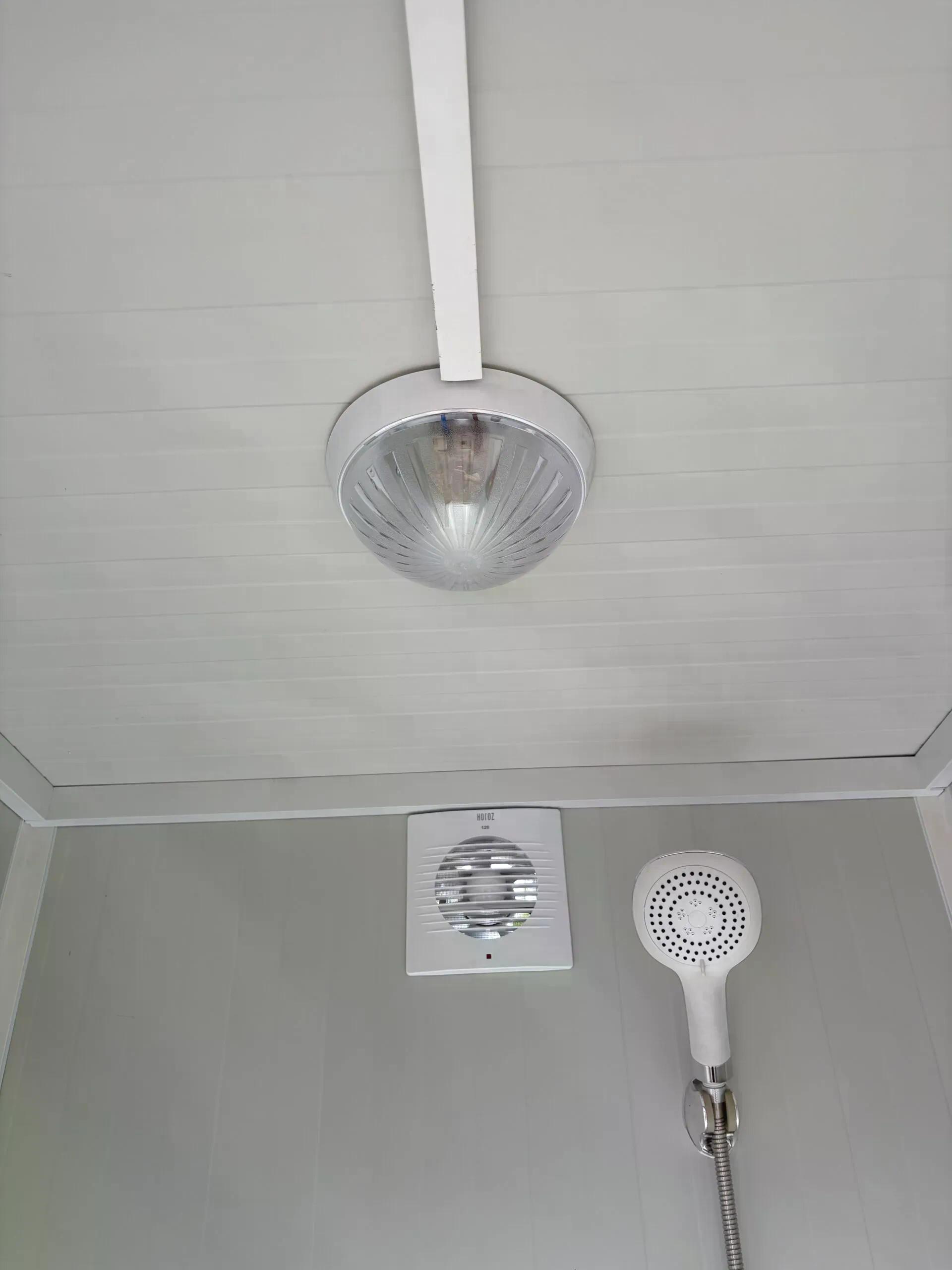 Ceiling of a dual portable shower unit.