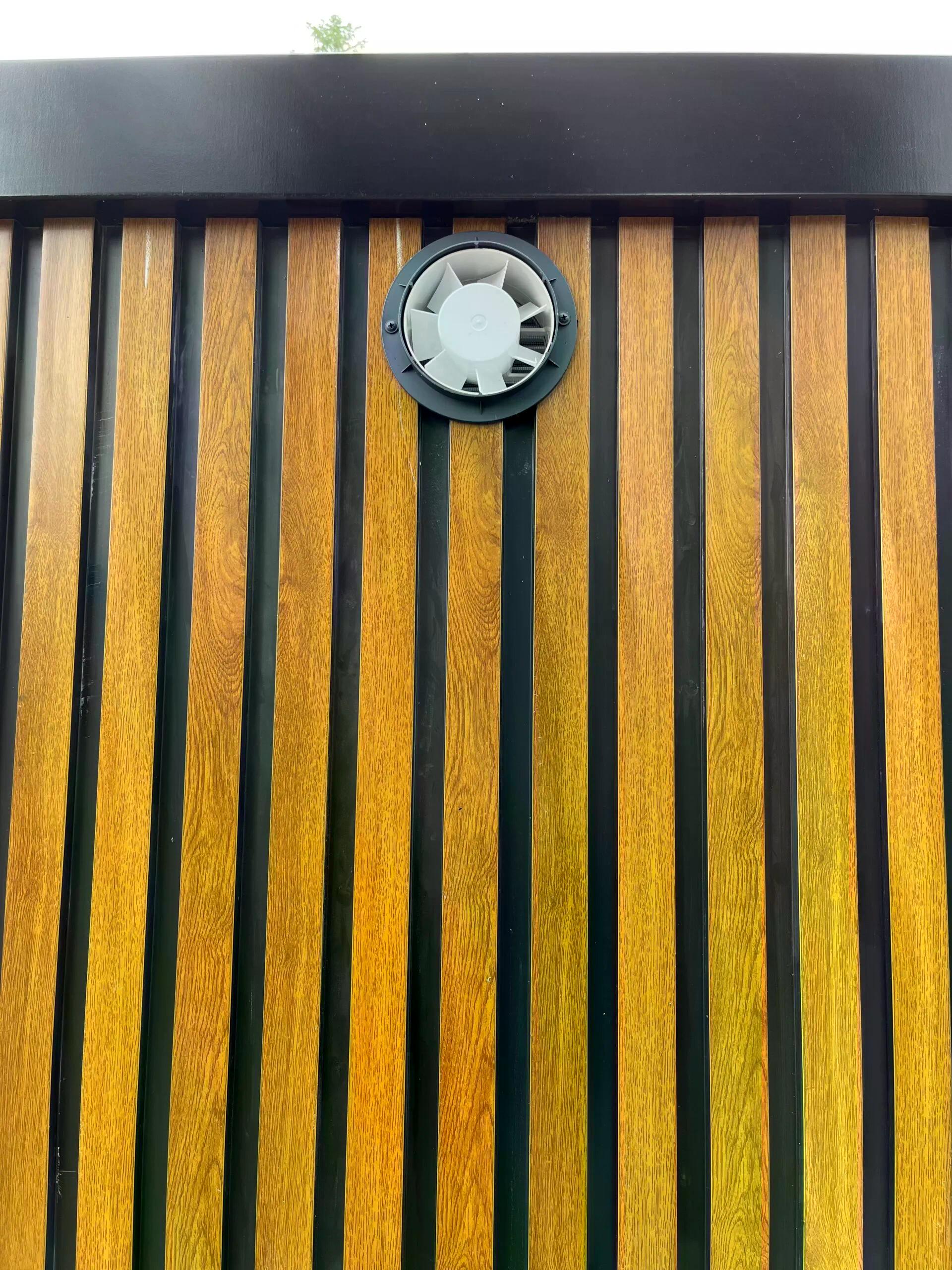 Electrical ventilation system inside a dual portable shower unit.