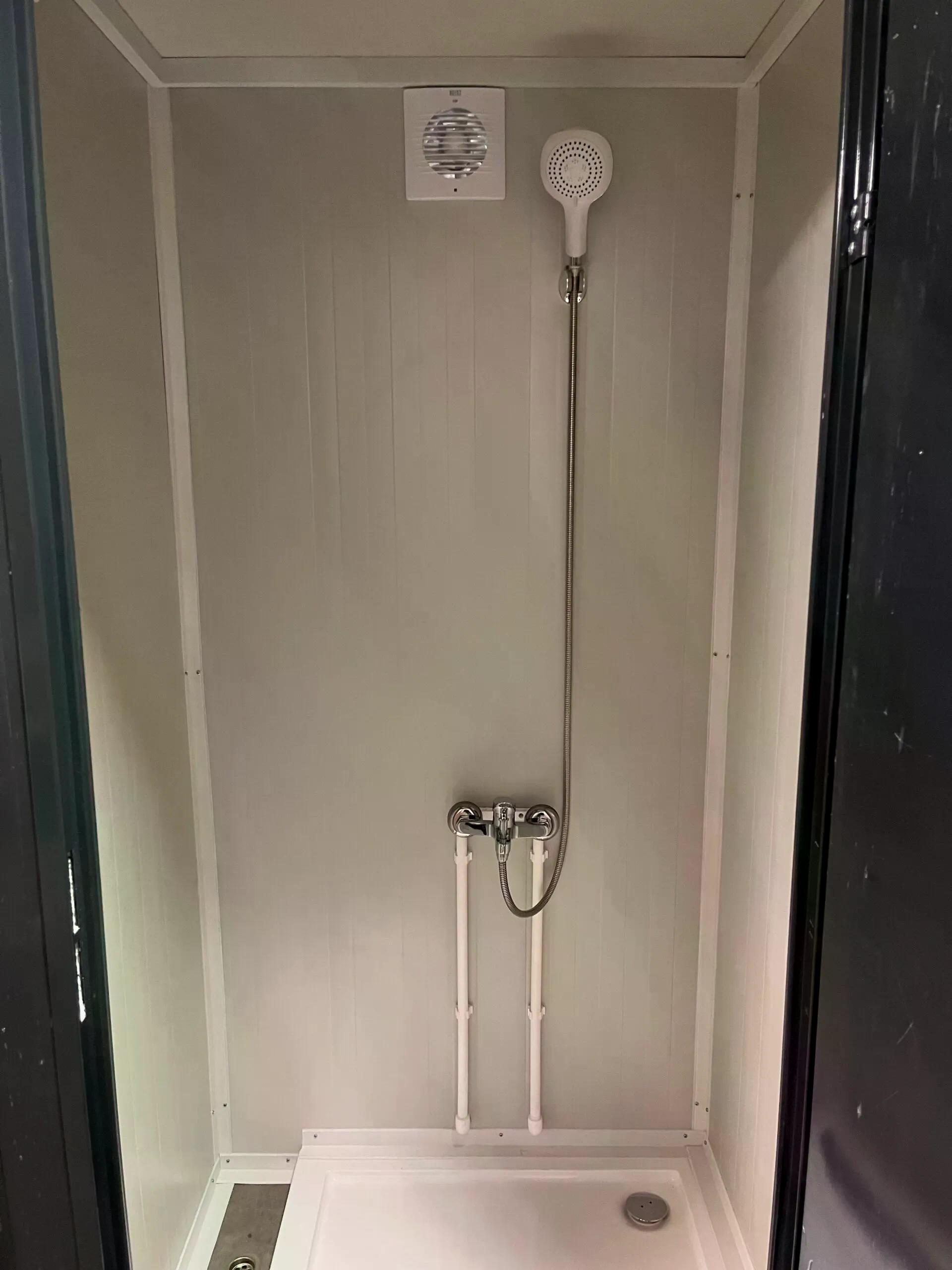 Interior of a dual portable shower unit.
